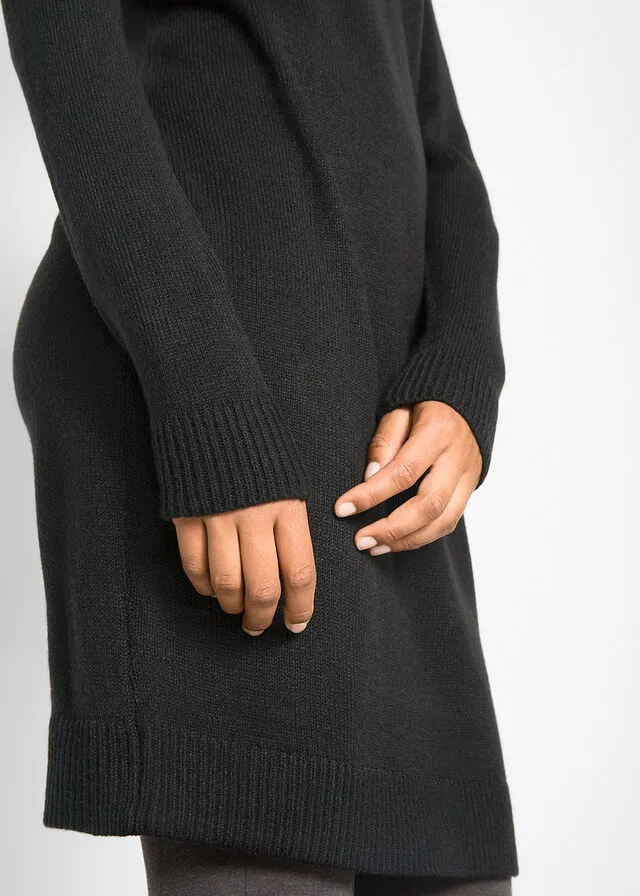 Black high-neck fine knit dress.