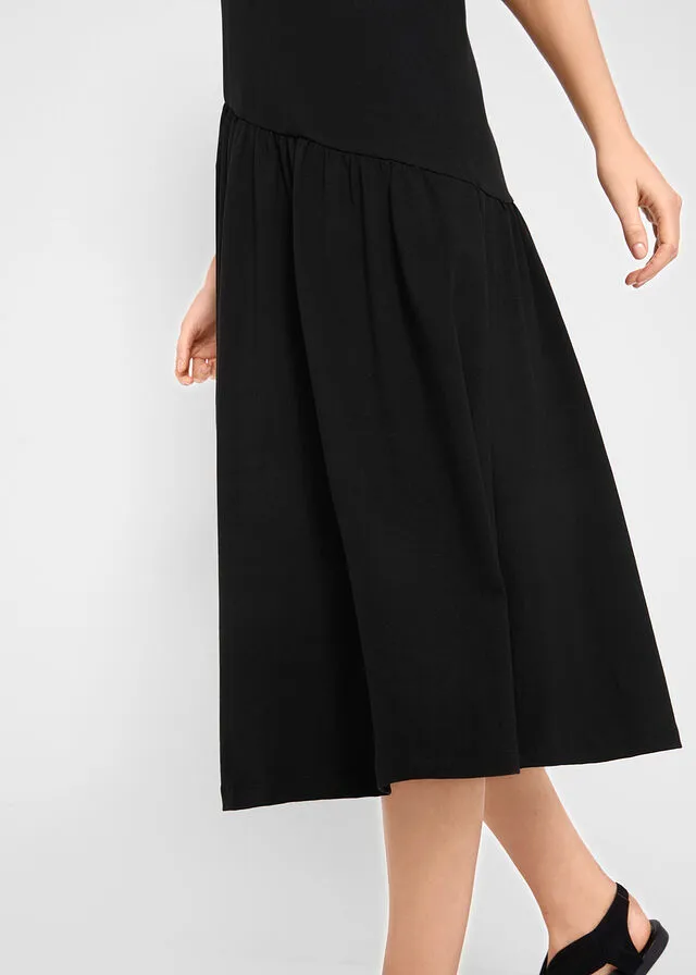 Black shirt dress with asymmetrical ruffles