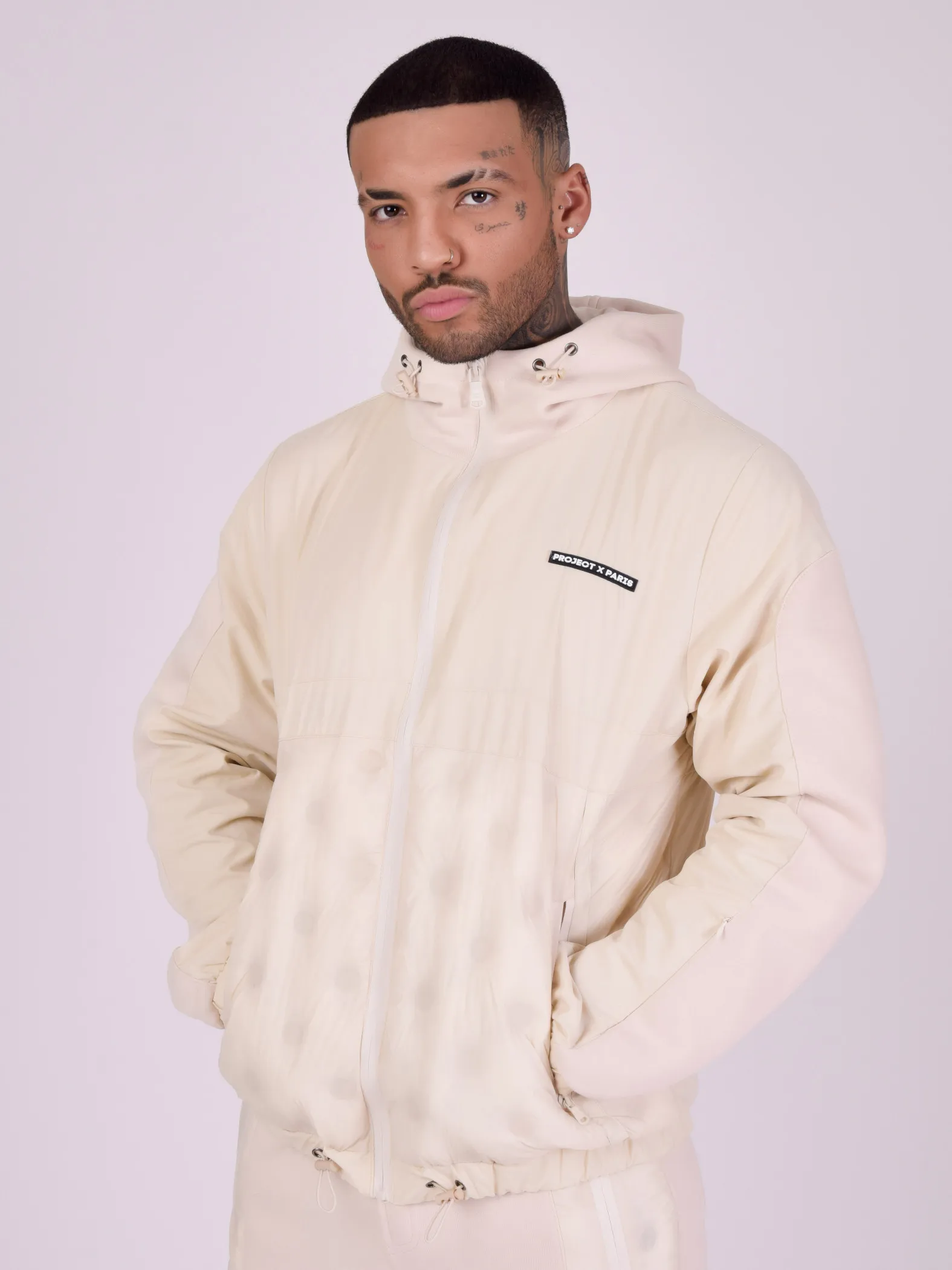 Two-Fabric Hooded Jacket with Round Quilting