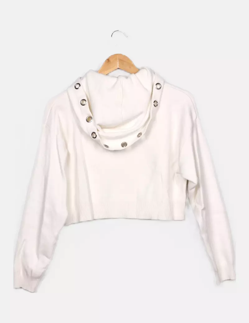 White knitted Zara sweatshirt.